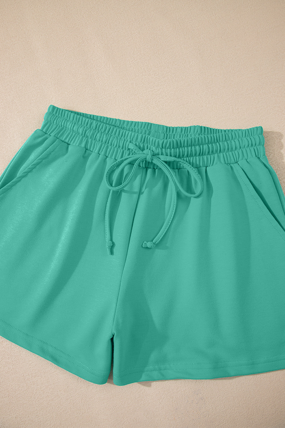Meadow Mist Green Solid Loose V Neck Half Sleeve Tee and Shorts