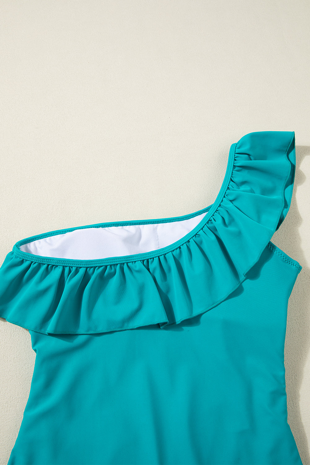Skobeloff Solid Color Ruffle Trim Asymmetric Neck One Piece Swimsuit