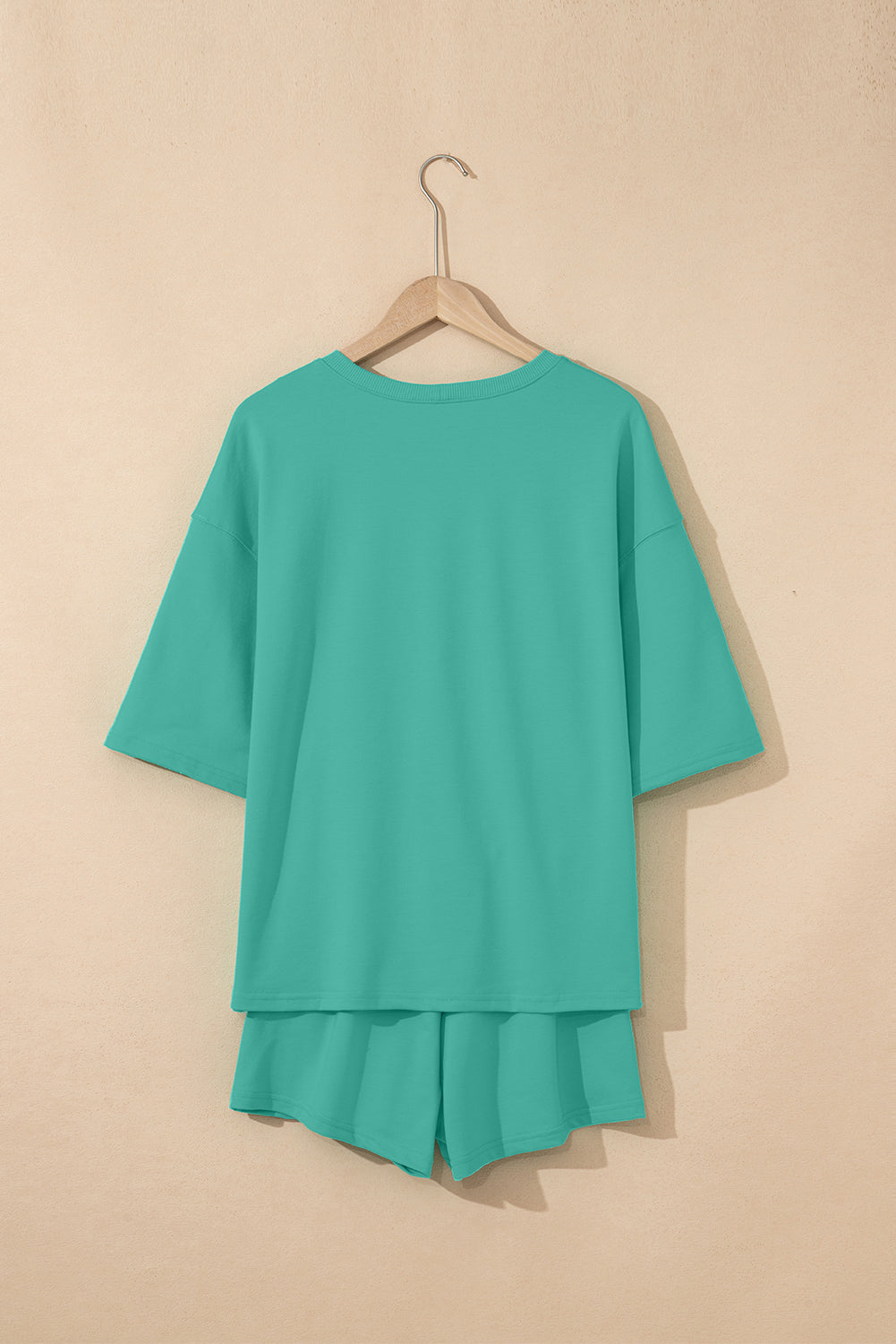 Meadow Mist Green Solid Loose V Neck Half Sleeve Tee and Shorts