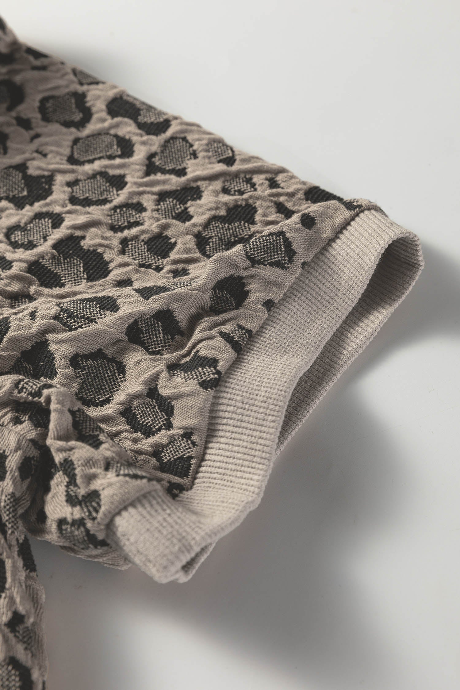Beige Zip up Collared Leopard Cap Sleeve Top