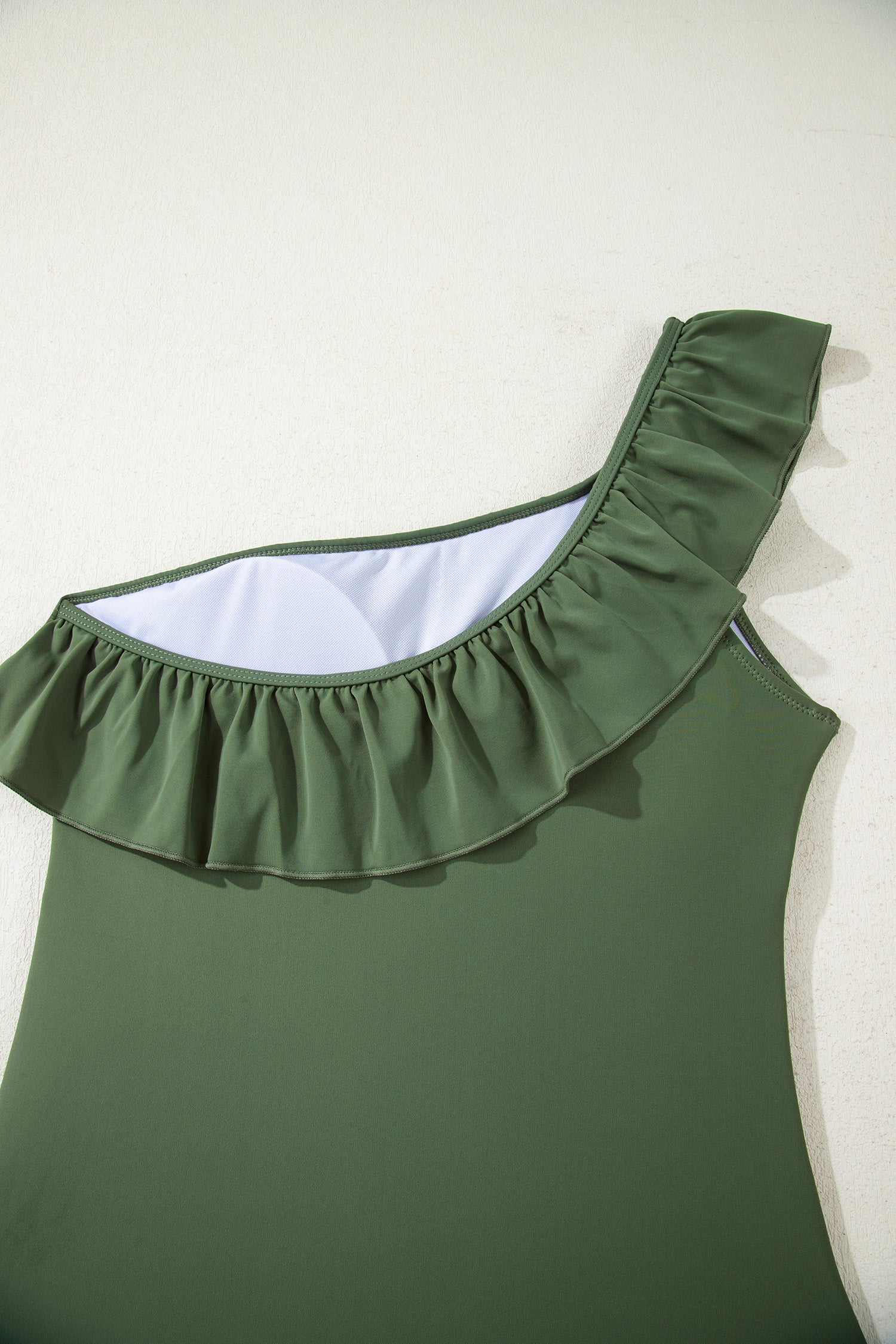 Skobeloff Solid Color Ruffle Trim Asymmetric Neck One Piece Swimsuit
