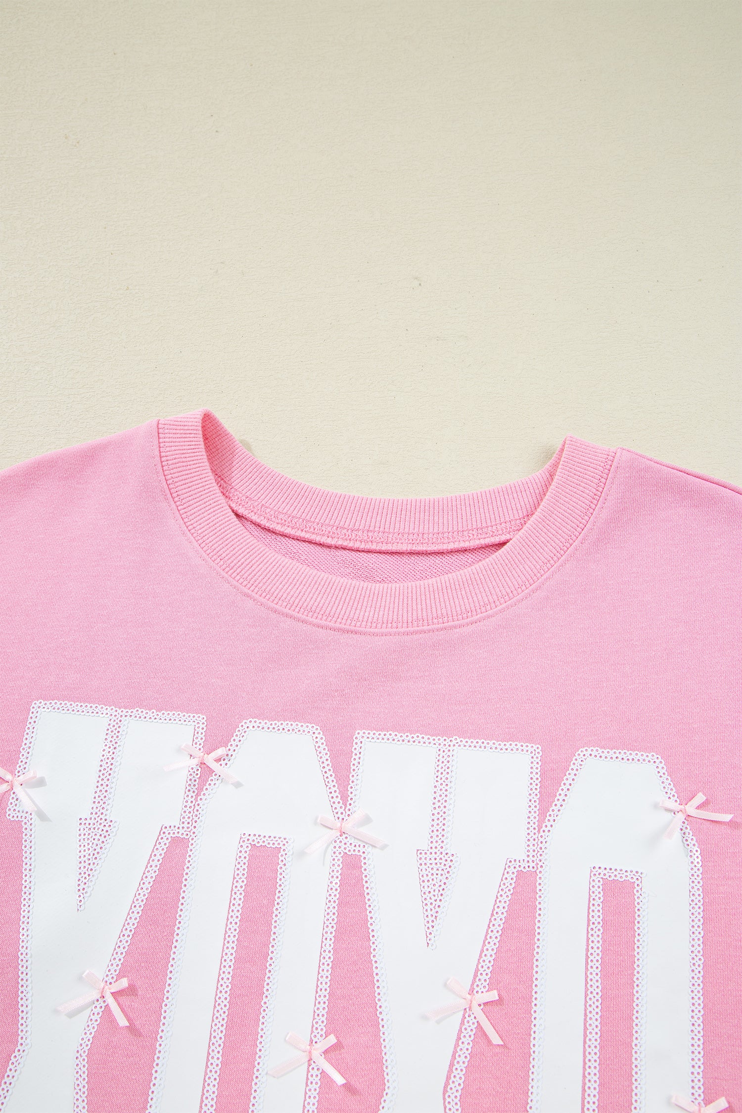 White Bow Sequin XOXO Letter Graphic Exposed Seam Baggy Sweatshirt
