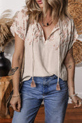 Jet Stream Geometric Embroidered Short Sleeve Tassel Tied V Neck Blouse