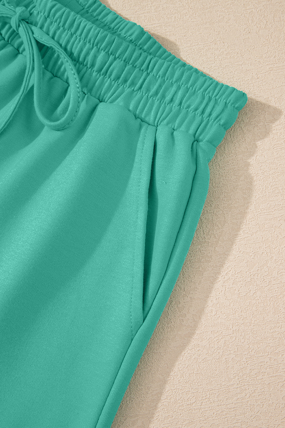 Meadow Mist Green Solid Loose V Neck Half Sleeve Tee and Shorts