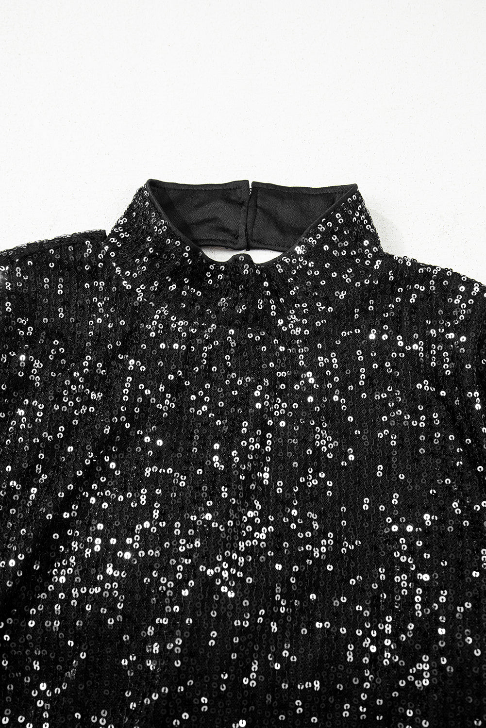 Jet Stream Sequin Mock Neck Drape Open Back Bell Sleeve Top