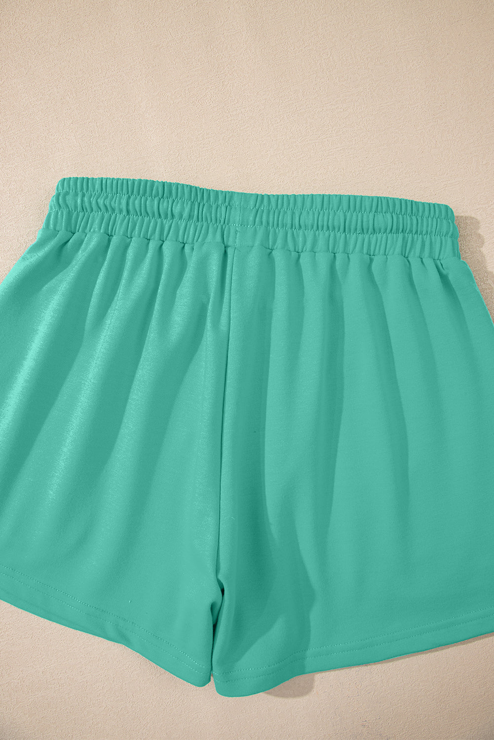 Meadow Mist Green Solid Loose V Neck Half Sleeve Tee and Shorts