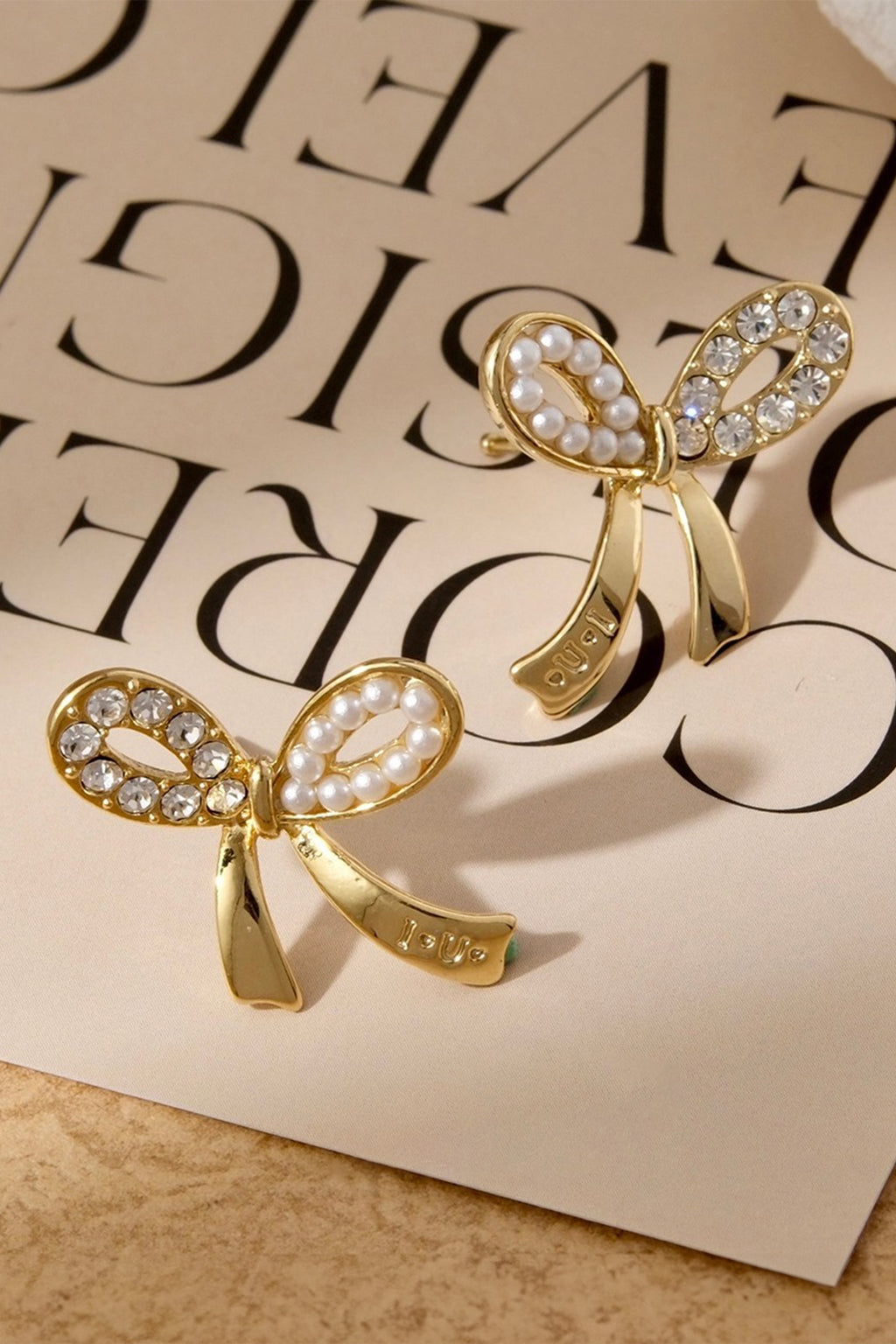 Gold Rhinestone Pearl Bow Earrings