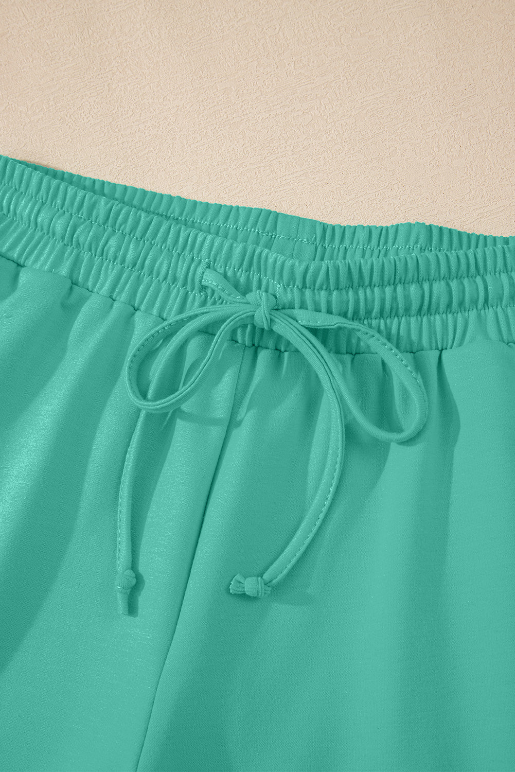 Meadow Mist Green Solid Loose V Neck Half Sleeve Tee and Shorts