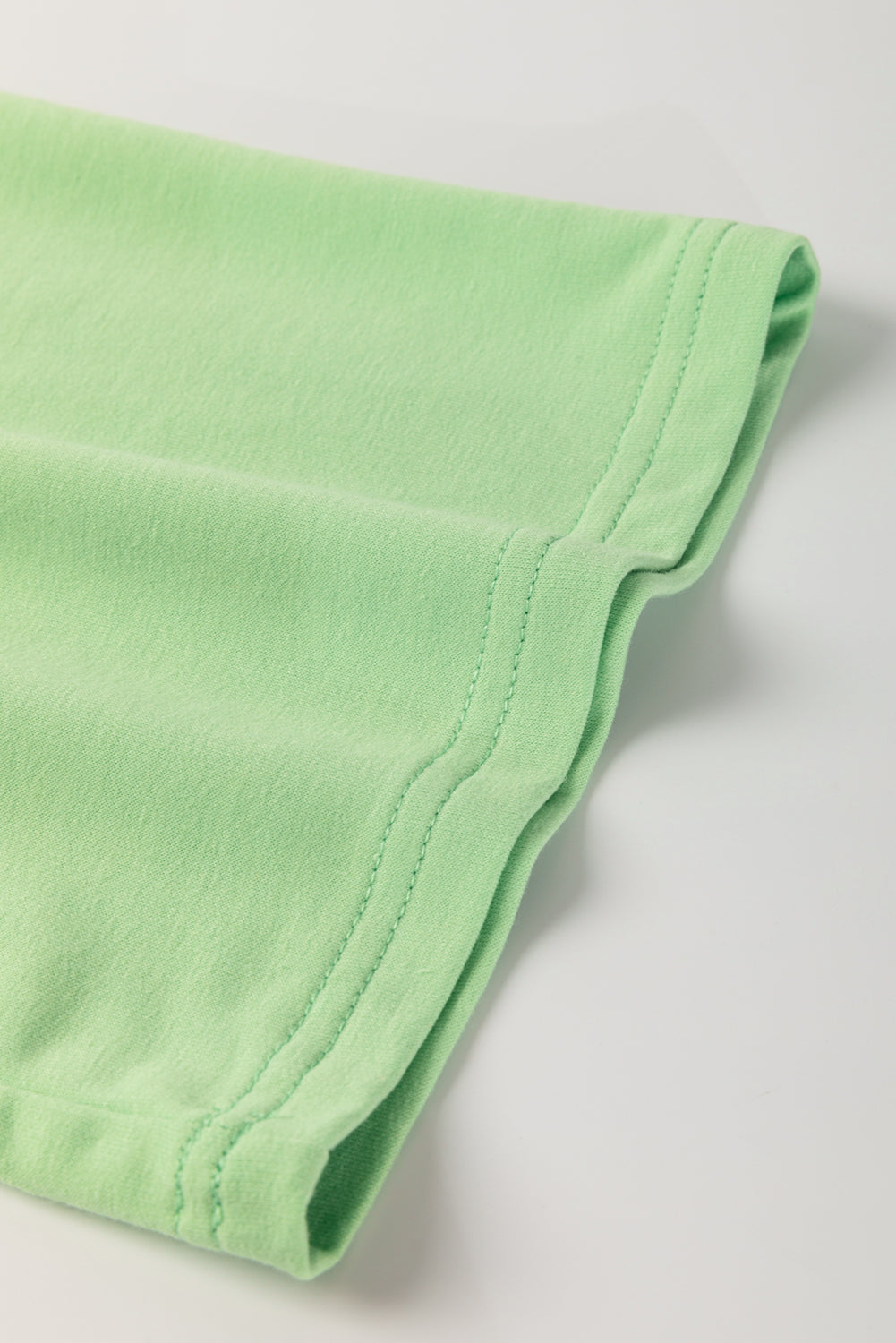 Meadow Mist Green Solid Loose V Neck Half Sleeve Tee and Shorts