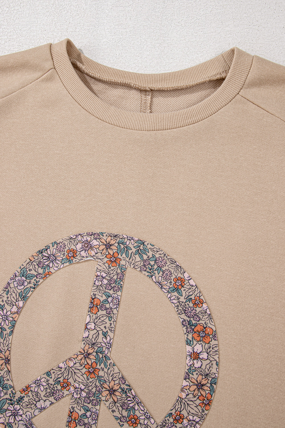 Beige Flower Patch Graphic Exposed Seam Wide Sleeve Top